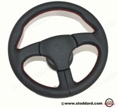 000-043-161-15-8YR Factory Sports Steering Wheel with Red Stitching and Embossed Porsche Logo. Fits 911 1974-1989