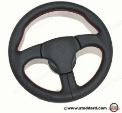 000-043-161-15-8YR Factory Sports Steering Wheel with Red Stitching and Embossed Porsche Logo. Fits 911 1974-1989   