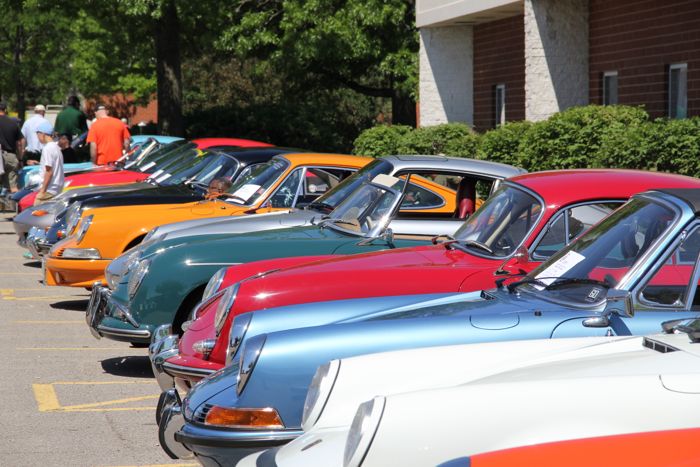 A row of 911s and other cars during the show