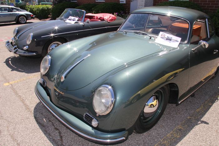A green 356 Coupe and a gray 356 roadster